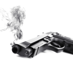 Smoking gun on white background, closeup