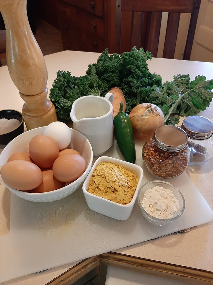 picture of frittata ingredients; eggs, vegetables, milk, flour and seasonings.